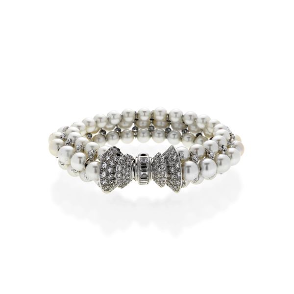 Rigid bracelet in white gold, diamonds and pearls