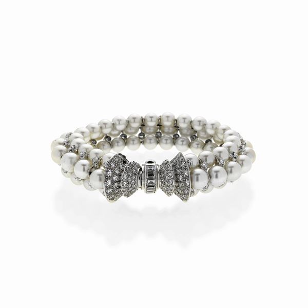 Rigid bracelet in white gold, diamonds and pearls