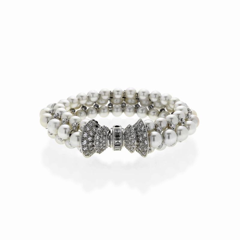 Bracciale rigido in oro bianco, diamanti e perle