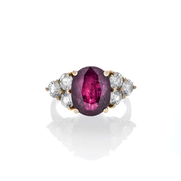 Ring in yellow gold, diamonds and natural ruby