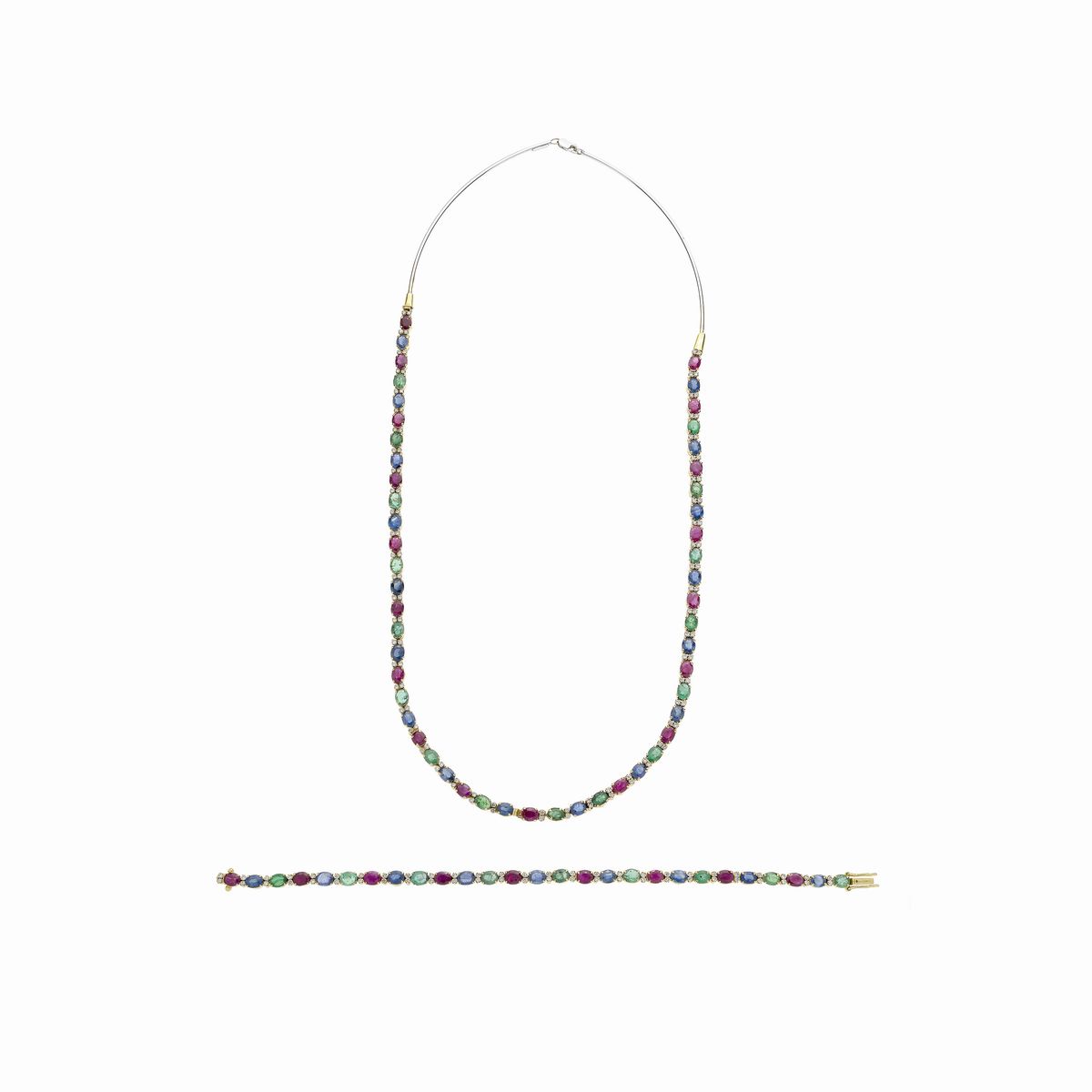 Tre bracciali trasformabili in collana in oro giallo 18 kt, diamanti, rubini, zaffiri e smeraldi