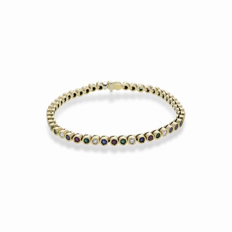 Bracciale tennis multicolor in oro giallo, diamanti, smeraldi, rubini e zaffiri