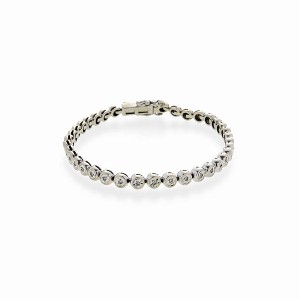 Tennis bracelet in white gold and diamonds