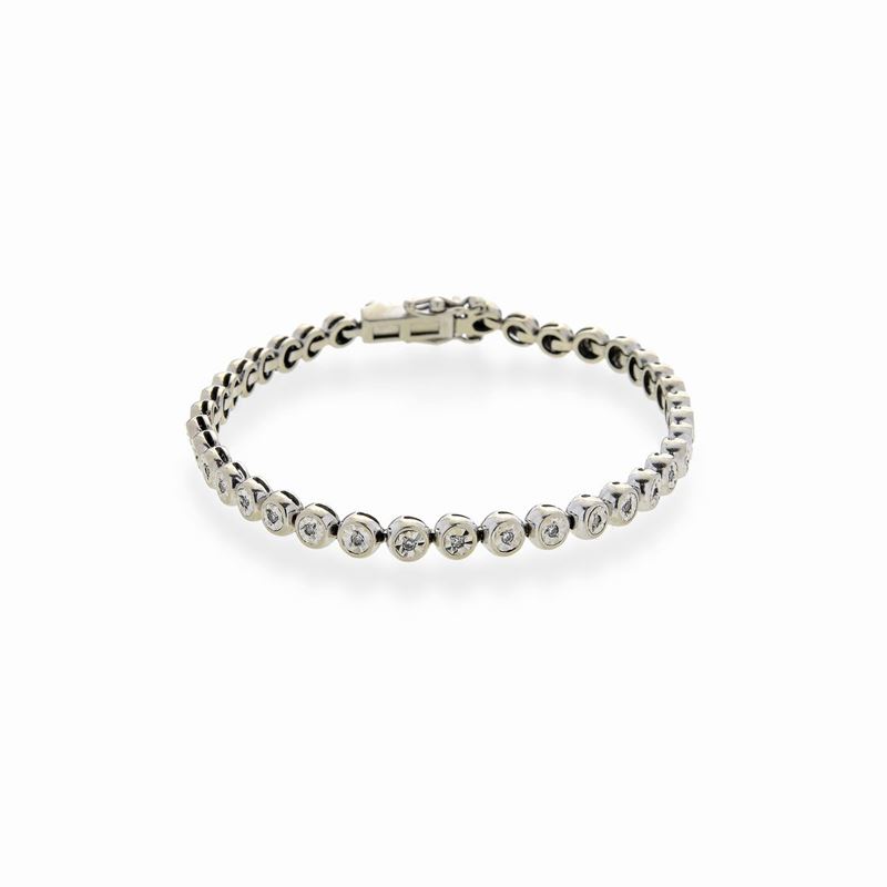 Bracciale tennis in oro bianco e diamanti