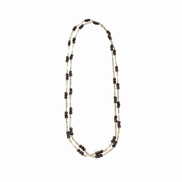 Lunga collana in oro giallo e granato