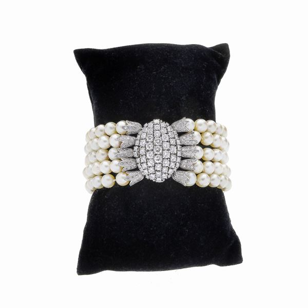 Bracelet in platinum, diamonds and cultured pearls