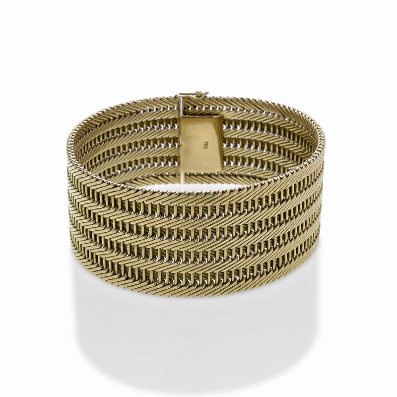 Alto bracciale in oro giallo