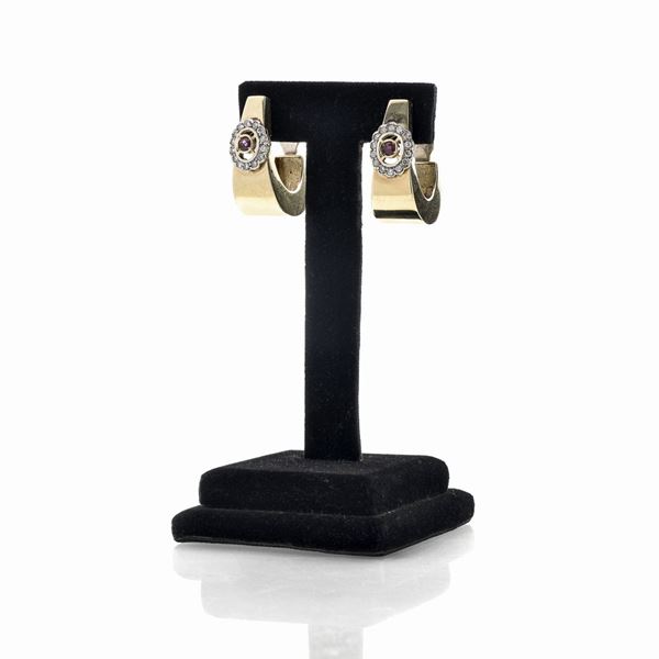 Earring in yellow gold, diamonds and rubies