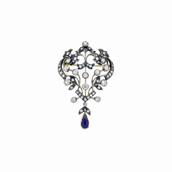 Brooch in low title gold, silver, diamonds and sapphires