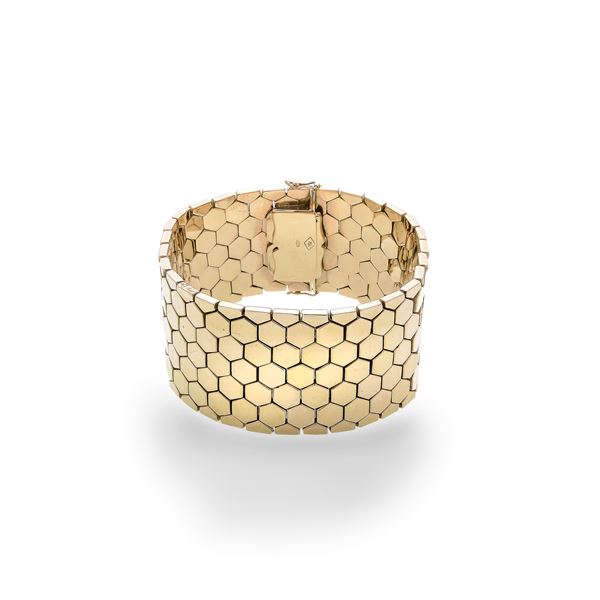 Band bracelet in yellow gold
