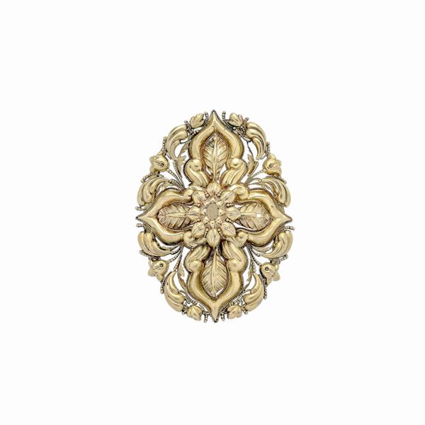 Large brooch of floral inspiration in yellow gold