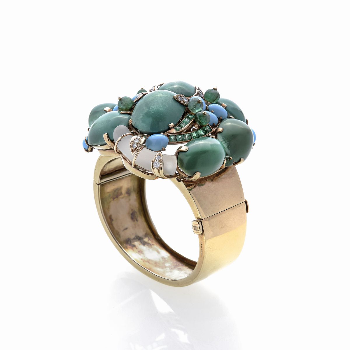 Grande bracciale in oro giallo, diamanti, cristallo di rocca, smeraldi e turchese David Webb