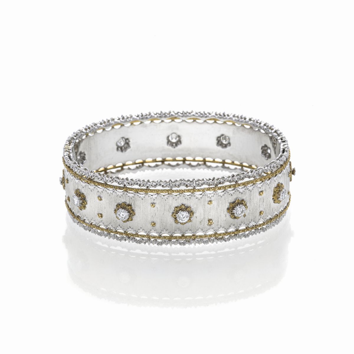 Bracciale rigido in oro bianco, oro giallo e diamanti Buccellati