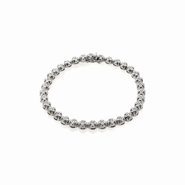 Bracciale tennis in oro bianco e diamanti