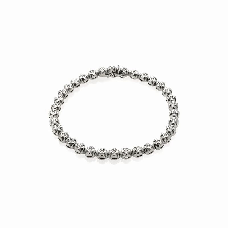 Bracciale tennis in oro bianco e diamanti