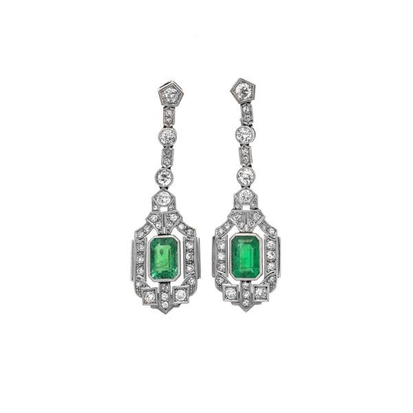 Pair of drop earrings in platinum, diamonds and emeralds