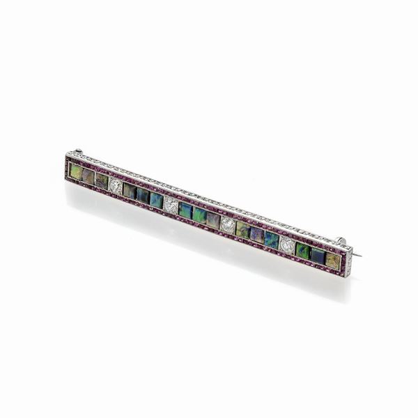 Bar brooch in platinum, rubies, diamonds and opal