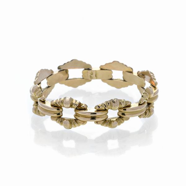 Bracciale a maglie fantasia in oro giallo