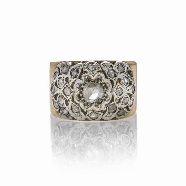 Anello a fascia in oro giallo, oro bianco e diamanti