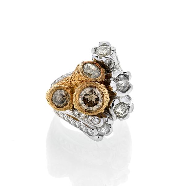 Ring in yellow gold, white gold, diamonds and brown diamonds