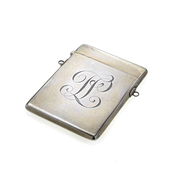 Silver cigarette case with engraved initials