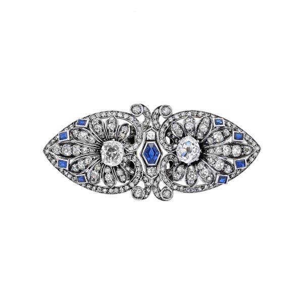 Brooch convertible into two clips in platinum, sapphires and diamonds
