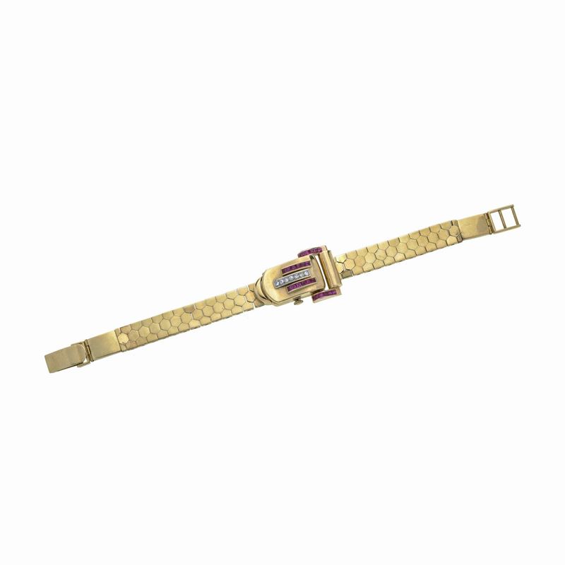 Bracciale orologio in oro giallo, diamanti e pietre rosse