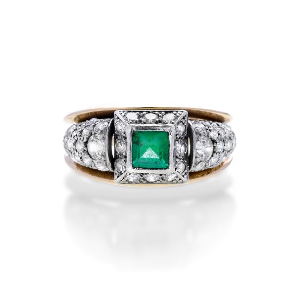 Ring in rose gold, white gold, diamonds and emerald