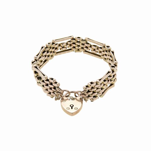 Bracciale con pendente a cuore in oro a basso titolo  (Inghilterra inizio del XX secolo)  - Asta Asta di  Gioielli Antichi, Moderni e Orologi da Polso - Curio - Casa d'aste in Firenze