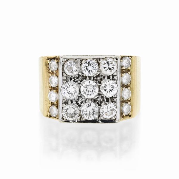 Shield ring in white gold, yellow gold and diamonds