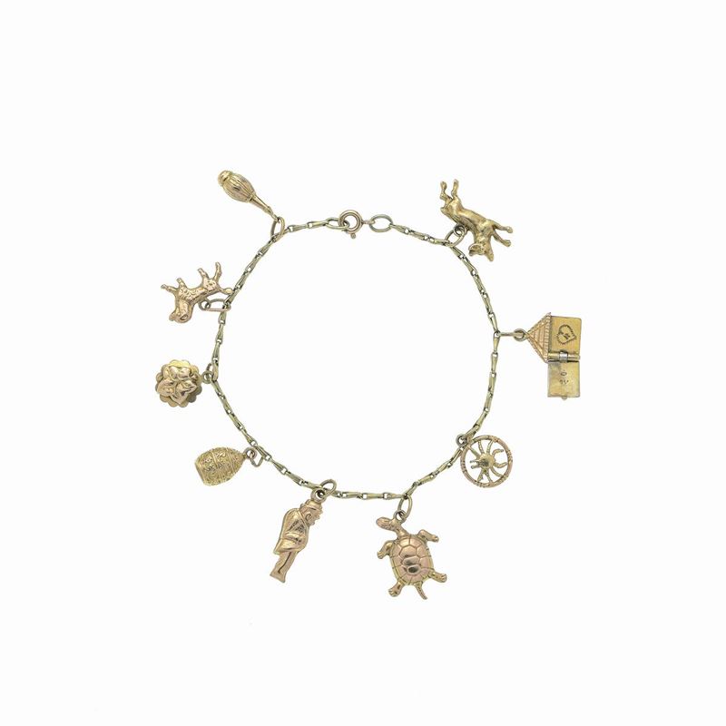 Braccialetto con charms in oro giallo