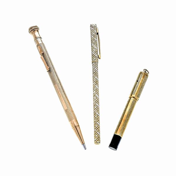 Penna in oro giallo e oro bianco 18 kt e altre due rivestite in oro