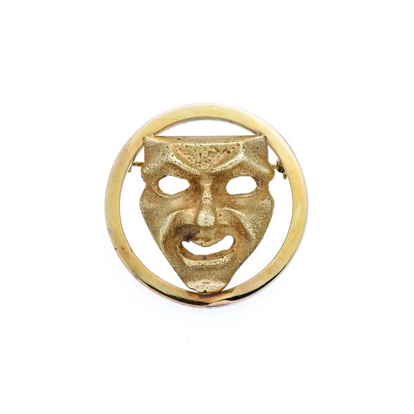 Mask brooch in 18k yellow gold