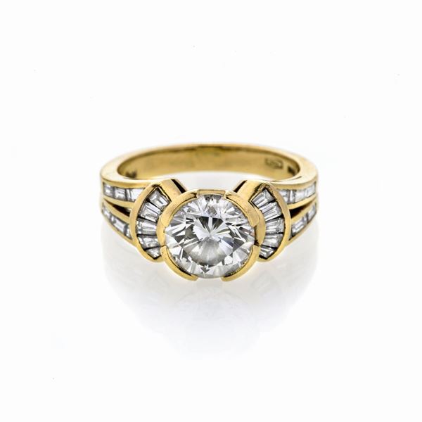 Solitaire ring in yellow gold and Damiani diamonds