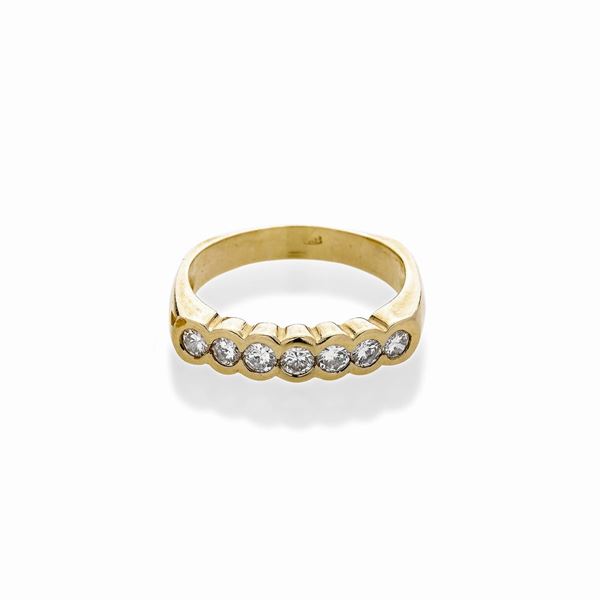 Anello rivière in oro giallo e diamanti