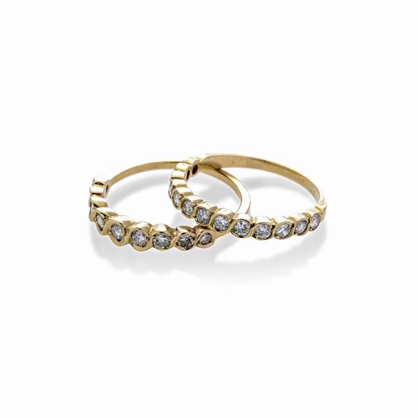 Two riviere rings in yellow gold and diamonds