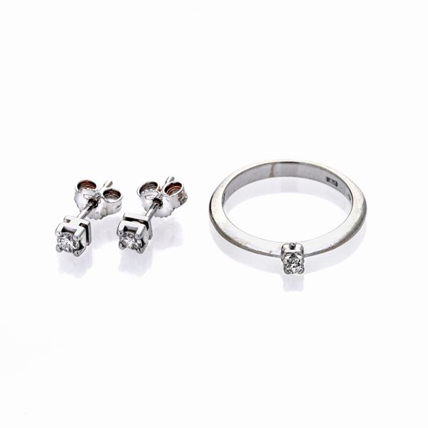 Pair of earrings and ring in white gold and diamonds  - Auction Auction of Jewellery, Precious Stones and Wristwatches - Curio - Casa d'aste in Firenze