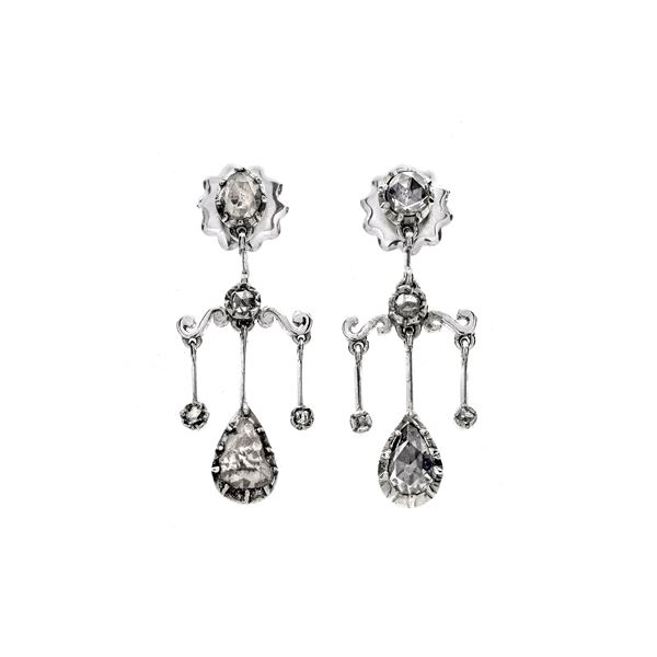 Pair of pendant earrings in white gold, silver and diamonds