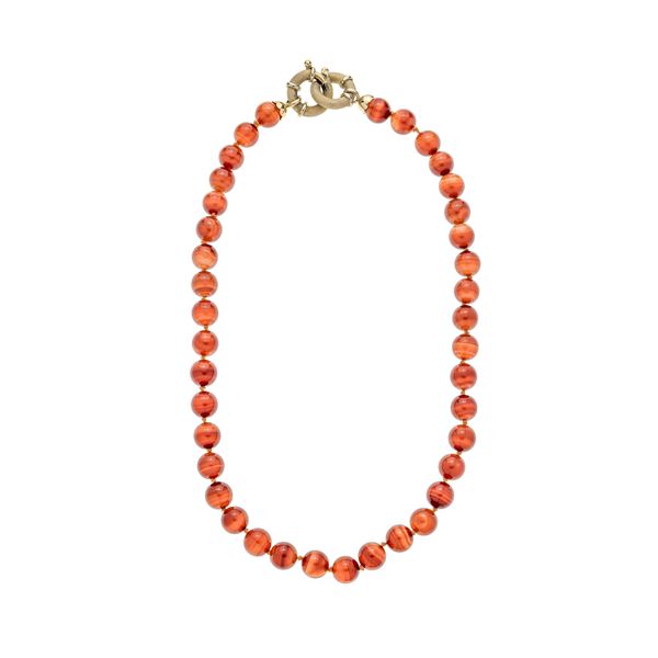 Yellow gold and carnelian necklace