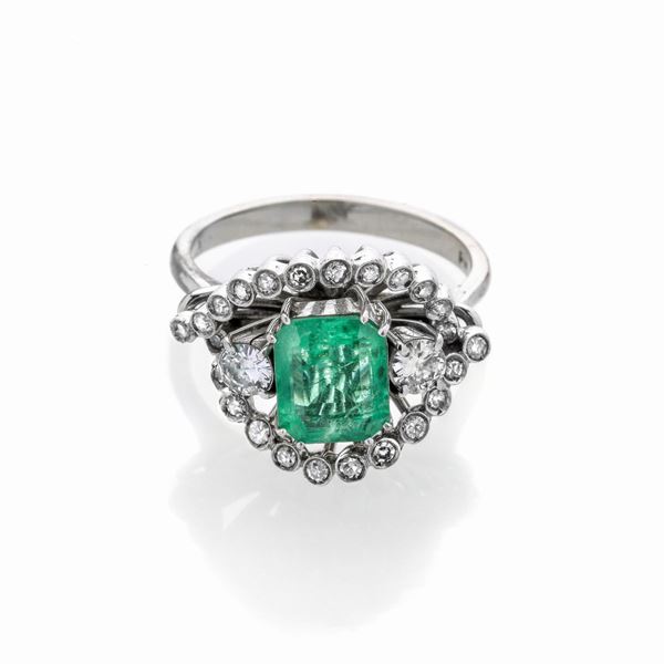 White gold, diamond and emerald ring