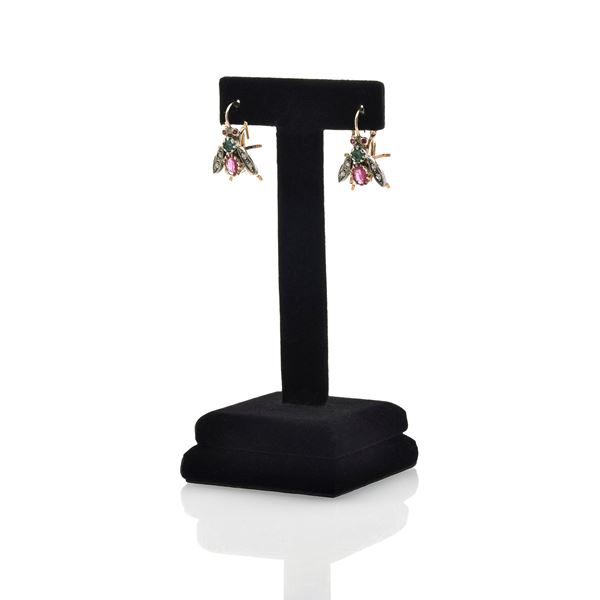 Pair of fly earrings in low title gold, silver, diamonds