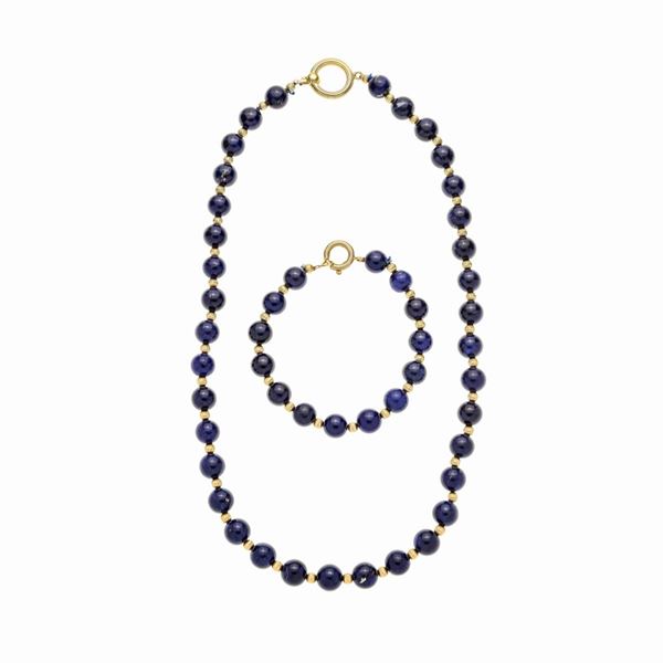 Parure composta da collana e braccialetto in oro giallo e lapislazzuli
