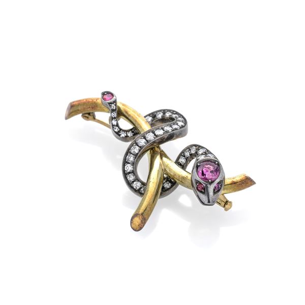 Snake brooch in yellow gold, silver, diamonds and rubies