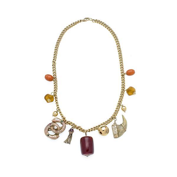 Necklace in 18k yellow gold, low title gold, amber, glass and diamonds