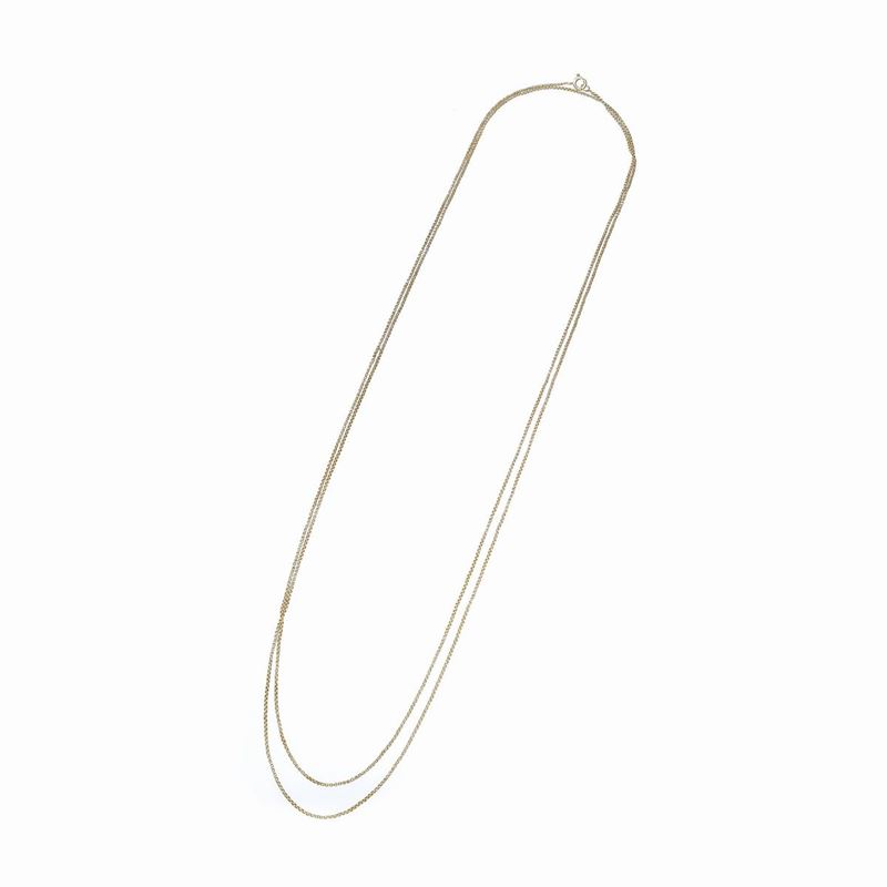 Lunga catena Manin in oro giallo 22k