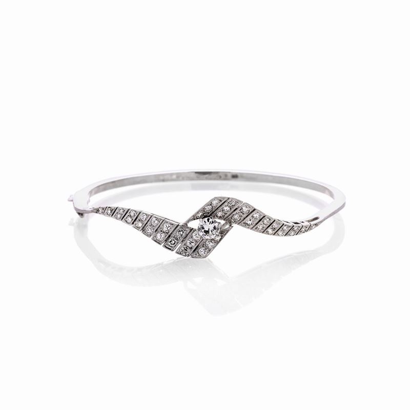 Bracciale rigido in oro bianco 18k e diamanti