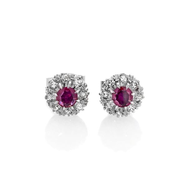 Pair of earrings in 18k white gold, diamonds and rubies
