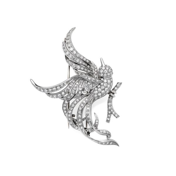 Bird of Paradise clip in 18k white gold and diamonds