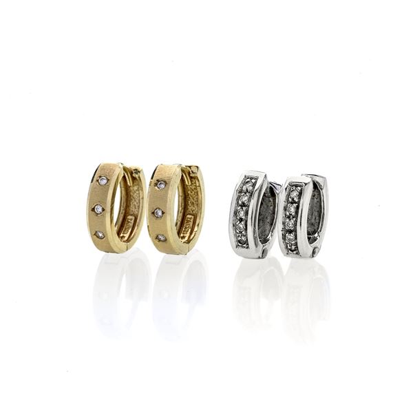 Two pairs of hoop earrings in 18k yellow and white gold and diamonds