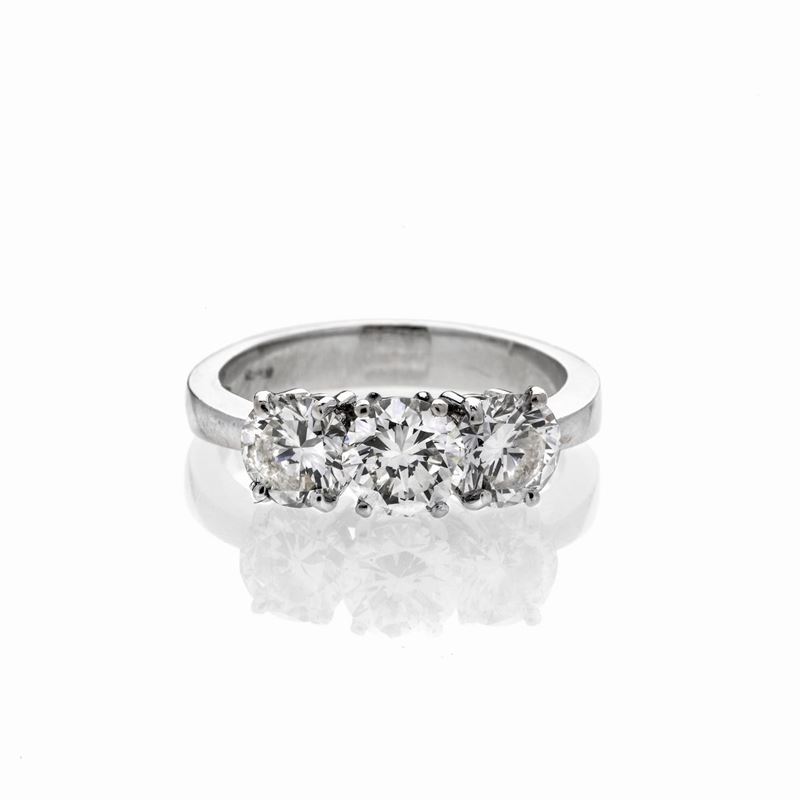 Anello Trilogy in oro bianco 18 kt e diamanti